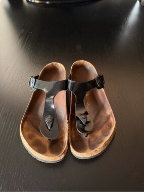 Birkenstock Black Sandals with Brown Footbed